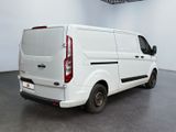 a white van that is parked in a room