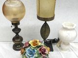 two lamps that are sitting next to each other on a table