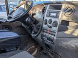 a dashboard of a truck with a steering wheel and dashboard controls