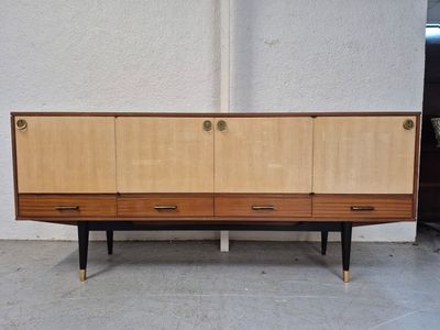 an image of a mid century style sideboard with four drawers