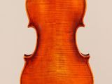 an old violin with a wooden back and a long neck