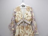 an image of a dress hanging on a hanger