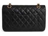 a chanel black quilted leather shoulder bag with gold hardware