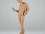 an image of a statue of a man standing on top of a wooden base