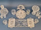 a lot of glass items that are on a table