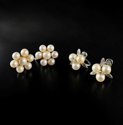 a pair of pearl and diamond earrings and a ring