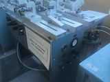 an image of a machine that is working on a piece of paper