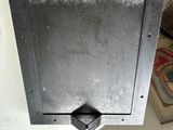 a picture of a metal box with a hole in it