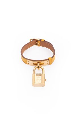 a close up of a bracelet with a lock on it