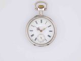 a close up of a silver pocket watch with roman numerals on it