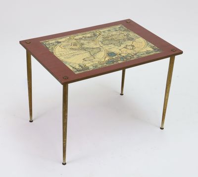 an image of a small table with a map on it