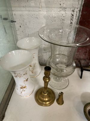 a lot of glass items sitting on the counter