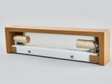 an image of a piece of wood and a roll of paper