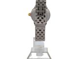 an image of a watch on a clear stand on a white background