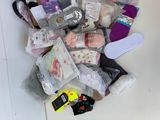 a pile of socks and other items on the floor