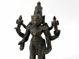 an image of a bronze statue of a woman holding two hands