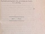 an old book with a black and white title on it