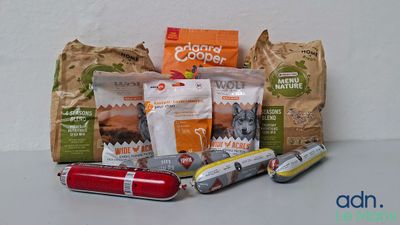 many different types of dog food on the table