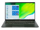 a laptop computer with a green screen and windows on the screen