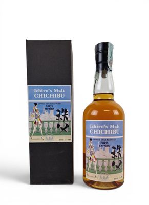 a bottle of chichibu whisky next to a box