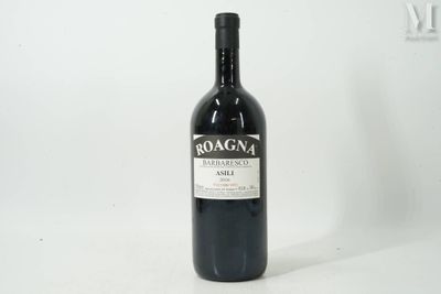 a bottle of wine that is sitting on a table