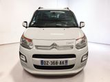the front of a white citrole parked in a white room