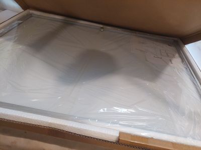 a cardboard box that is sitting on top of a cardboard box
