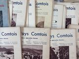 a lot of old books on the table together