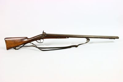 an old rifle on a white background with a white background