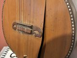 a guitar that is on display in a room