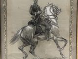 tableau représentant un homme à cheval, encadré et accroché au mur