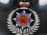 a close up of a badge on a motorcycle