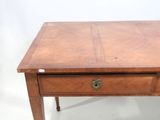 an image of a wooden table with a drawer on it