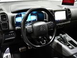 the interior of a car with a steering wheel, dashboard, and dash board