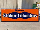 a large orange and blue sign that says kleier - colonels