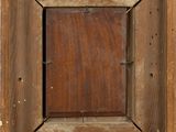 an image of a picture of a wooden frame with a sticker on it