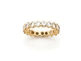 a yellow gold ring with white diamonds on a white background