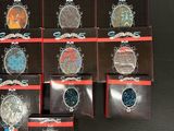 a lot of watches that are on display on the table