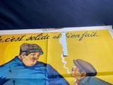 a poster of a man smoking a cigarette next to a poster of a man smoking a cigarette