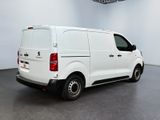 a picture of a white van parked in a room