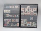 a lot of stamps on the cover of a book