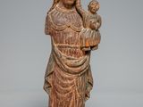 an image of a statue of a woman holding a bird