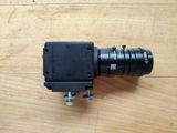 a camera that is sitting on a wooden floor