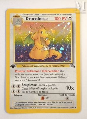a close up of a pokemon card on a white surface