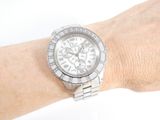 a woman that is wearing a watch on her wrist