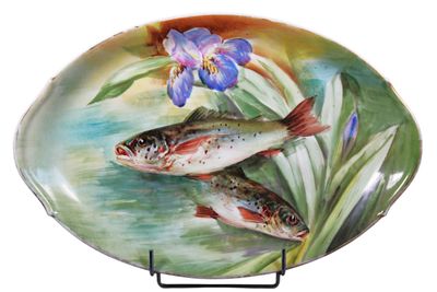 PLAT ovale en porcelaine à décor de truites, vers … - Photo 1