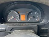 a close up of a car dashboard with a speedometer