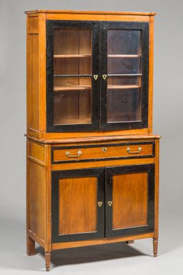 a wooden cabinet with glass doors and drawers on top