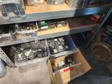 a shelf full of assorted electrical components in a room