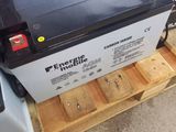 an image of a couple of batteries sitting on top of a pallet